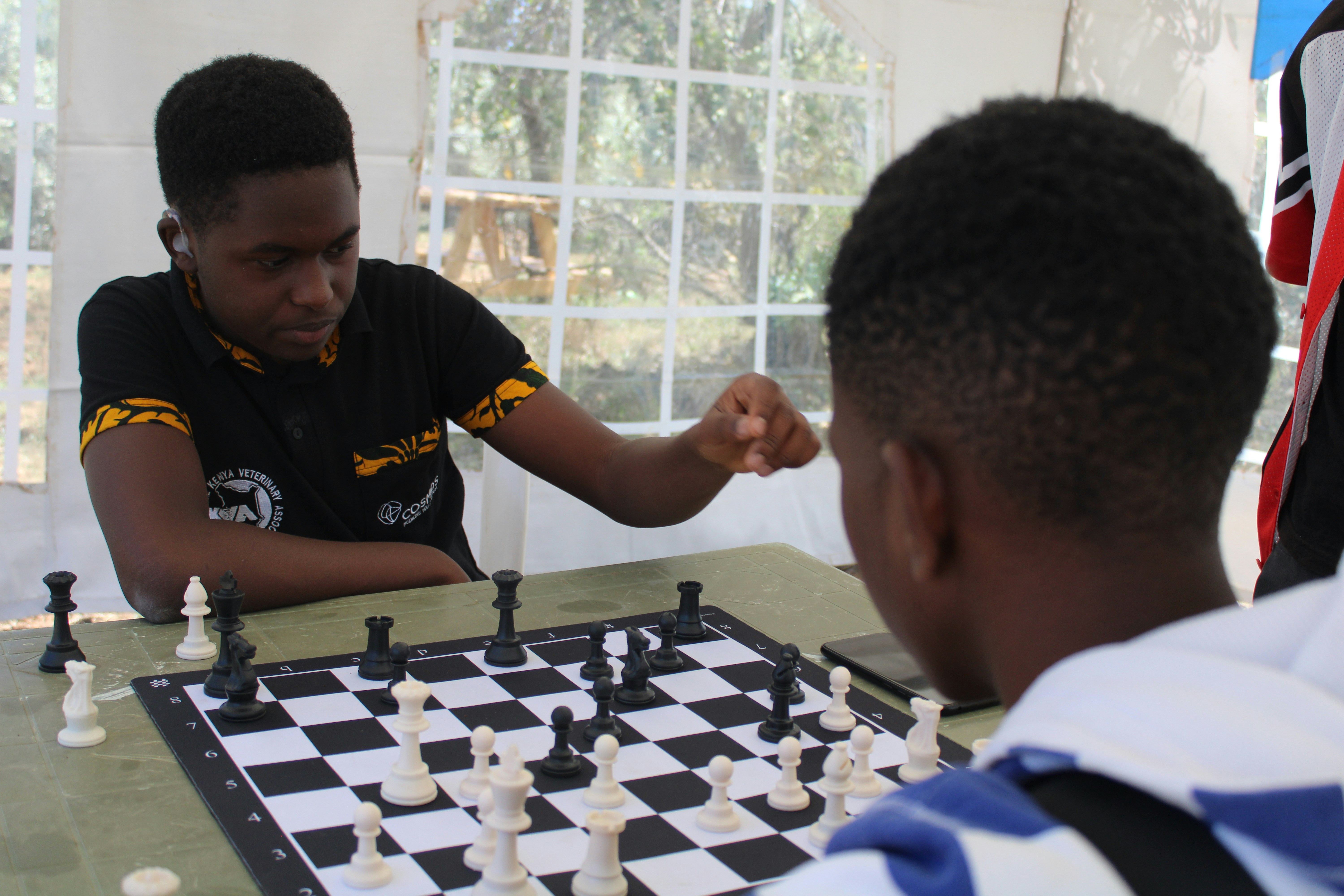 Two Youngster Playing Chess